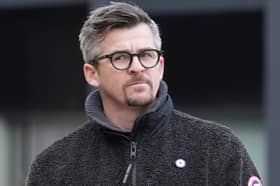 Joey Barton has been charged with wounding with intent following an alleged assault on Sunday near a golf club