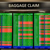 TSA wait time at Ronald Reagan Washington National Airport and LaGuardia Airport. The arrivals board displaying multiple canceled and delayed flights is shown at Ronald Reagan Washington National Airport in Arlington, Virginia, on March 16, 2026. A severe storm system is sweeping the Eastern US, bringing a high-risk threat of damaging winds, tornadoes, and torrential rain from Florida to Pennsylvania. Over 34 million people are under threat, with major impacts on air travel. (Photo by Daniel SLIM / AFP via Getty Images)