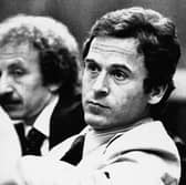 Ted Bundy leans back in his chair as trial judge Edward Cowart speaks in Tallahassee, Florida in 1979