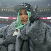 Artist Cardi B poses for a photo following the AFC Championship Playoff game against the Denver Broncos