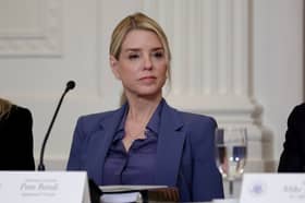 Attorney General Pam Bondi listens as U.S. President Donald Trump speaks during a lunch with the Trump Kennedy Center Board Members