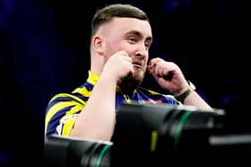 England's Luke Littler reacts during his match against Netherlands' Gian van Veen on night nine of the BetMGM Premier League 2026 at the AO Arena, Manchester