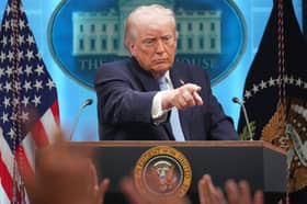 President Donald Trump speaks with reporters during a news conference in the James Brady Press Briefing Room at the White House on Monday