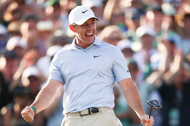 Rory McIlroy of Northern Ireland celebrates winning the 2026 Masters Tournament on the 18th green at Augusta National Golf Club