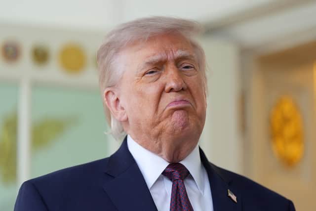 President Donald Trump speaks outside the Oval Office of the White House