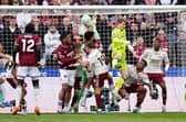 Arsenal goalkeeper David Raya (centre left) is fouled by West Ham United's Pablo Felipe in the build up to Callum Wilson disallowed goal during the Premier League match at London Stadium, London