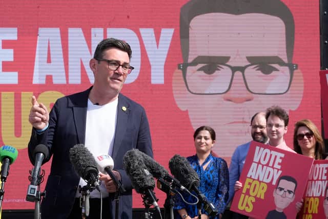 Andy Burnham makes a speech surrounded by supporters at the launch of his campaign as Labour's candidate for the Makerfield by-election