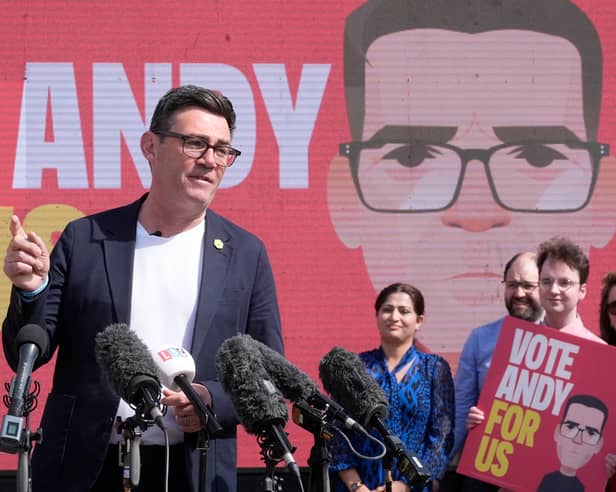 Andy Burnham makes a speech surrounded by supporters at the launch of his campaign as Labour's candidate for the Makerfield by-election 