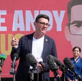 Andy Burnham makes a speech surrounded by supporters at the launch of his campaign as Labour's candidate for the Makerfield by-election 
