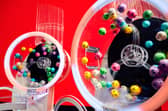 The two Lotto draw machines to mark the new two-round format giving players two chances to win with every £2 line