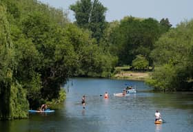 People paddleboard along the River Thames in Wallingford, Oxfordshire, during the May heatwave