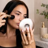The Beautifect Glow Compact features adjustable lighting and a magnified mirror for on-the-go touch-ups