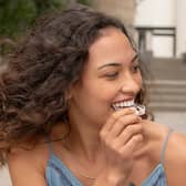 Invisalign aligners being attached.