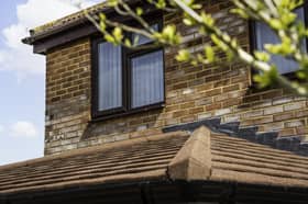 A modern home extension featuring double-glazed window installations and roofline improvements by Reliant Windows.