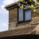 A modern home extension featuring double-glazed window installations and roofline improvements by Reliant Windows.