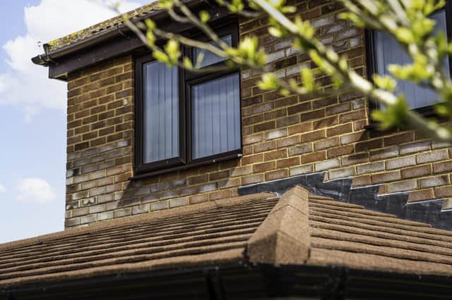 A modern home extension featuring double-glazed window installations and roofline improvements by Reliant Windows.