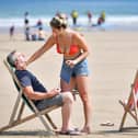 Sunscreen being applied