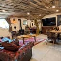 The Tolkien-inspired Hobbit homes are built into the hillside in the Welsh countryside.