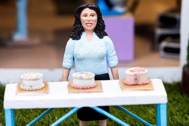 A miniature Nigella Lawson has joined the cast of the 'Great British Bake Off' - at a model village.