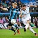 Aston Villa's John McGinn fights for the ball with Club Brugge's Joaquin Seys in the Champions League