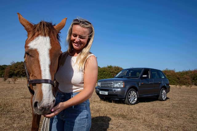Alicia Moss with her new car and her pony.