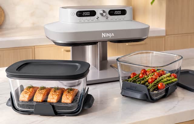 The glass CleanCrisp containers on the Ninja CRISPi Dual Zone Air Fryer let you see food as it cooks, while their heat-safe handles make it easy to take dishes straight from the air fryer to the table.