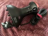 The Bellissima Italia Diffon Worldwide combines a curly hair dryer and diffuser in one lightweight, travel-ready tool.