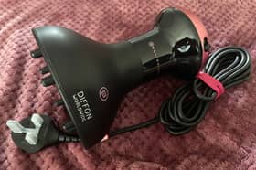 The Bellissima Italia Diffon Worldwide combines a curly hair dryer and diffuser in one lightweight, travel-ready tool.