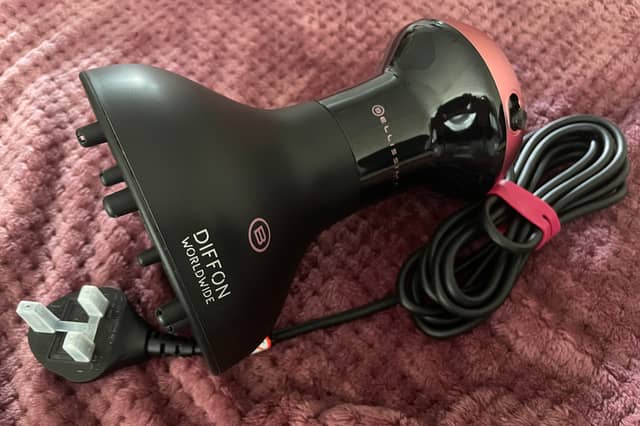 The Bellissima Italia Diffon Worldwide combines a curly hair dryer and diffuser in one lightweight, travel-ready tool.