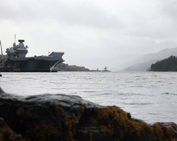 HMS Queen Elizabeth alongside Glen Mallan before heading to Edinburgh.