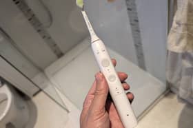 Hardly a budget toothbrush, but this one takes a simpler approach to providing a quality clean for your teeth