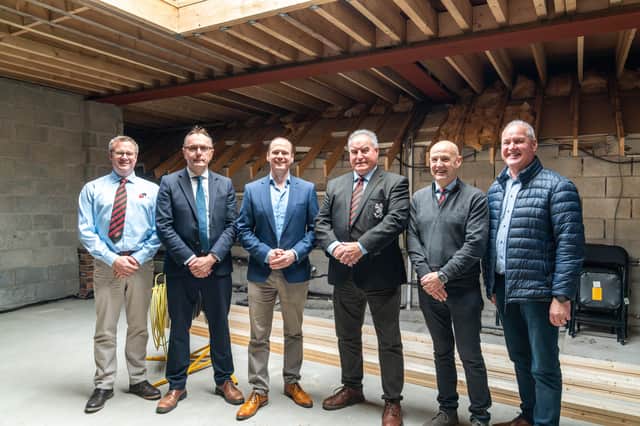 Minister Lyons meets with representatives from Rainey Rugby Football Club to view
ongoing work facilitated by the Northern Ireland Community Infrastructure Fund.