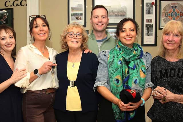 Family members of the late Ernie Cockburn, from left, daughters Louise Glackin and Angeline Magee, wife Goretti, daughter Anne McGarrigle, son Nigel and sister Sandra Wardle. Missing from the photograph are daughter Lorraine Collins and sons George and Uel Cockburn. IB0343CD26