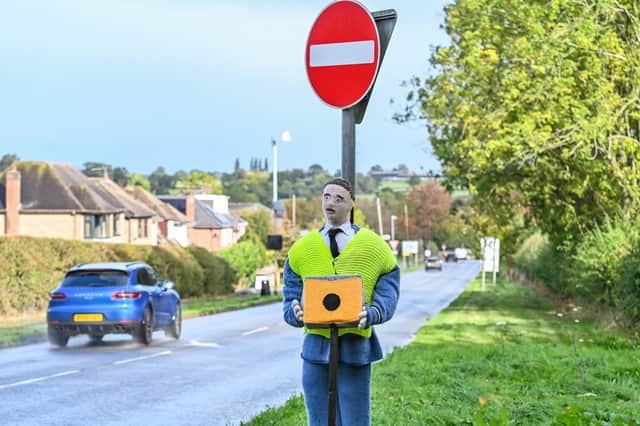 Villagers in Fillongley have created knitted speed cameras and mock traffic officers in a bid to slow motorists
