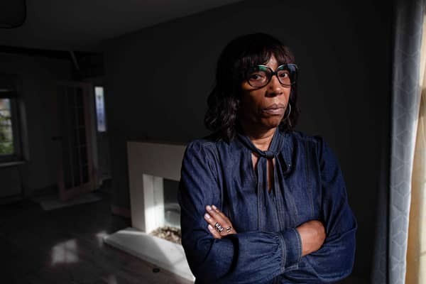 Collette McFarlane inspects her rental property, which she says was trashed by tenants.