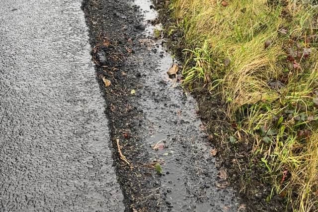 The edge of the road which has been described as a danger to motorists.
