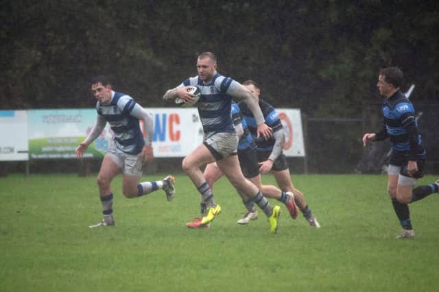 Kyle Gormley makes a break through Shannon's defence.