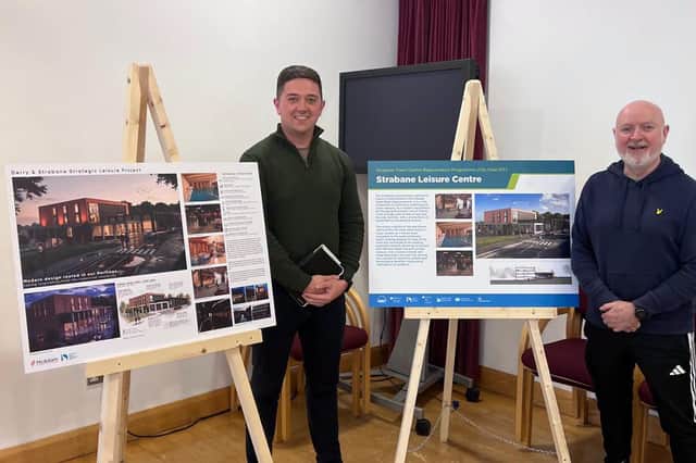 Sinn Féin MLA., Paul Boggs and councillor Brian Harte, looking over plans for the new leisure centre at the recent public consultation.