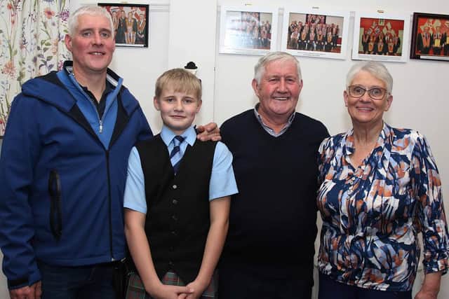 Three generations of past and present members of Blossomhill Pipe Band, the Woods family, from left: Chris and son Alfie and his parents, George and Lucy Woods. IB3644CD26