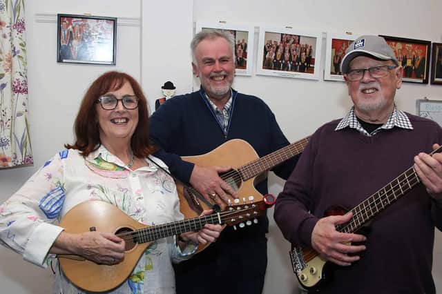 Members of the Strule River String Band: Claire, Shane and Ian who performed at the Blossomhill Hall Centenary Concert. IB3944CD26