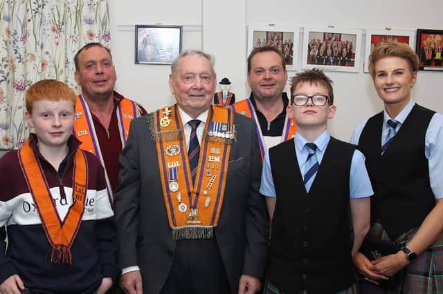 Three generations of past and present members of Blossomhill Pipe Band: Bert Wilson; his sons Norman and Ivor; grandsons Henry and Louis; and daughter-in-law Yvonne. IB4044CD26