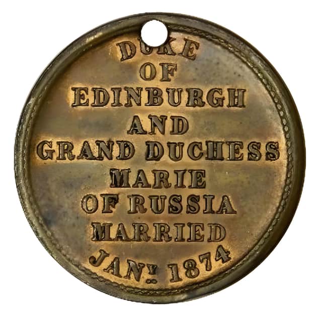 A distinctive bronze-coloured medallion was found hanging from a 24-inch chain