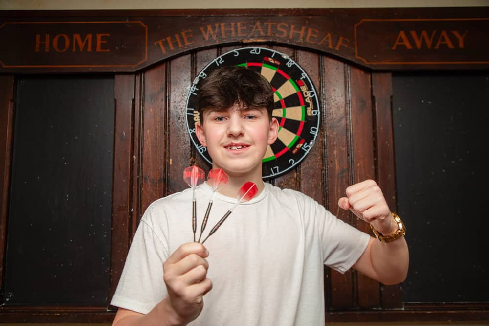 Makinley Cooper-Johnson, known as Mighty Mak, at home in Wrexham, the 14-year-old is set to go head-to-head against Luke Littler in a bid for a £500,000 prize. 