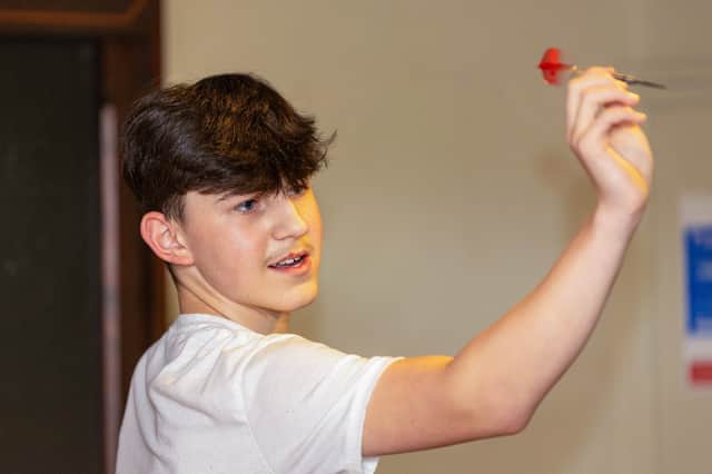 The Wrexham teenager is completely self-taught and practises darts at home with his family.