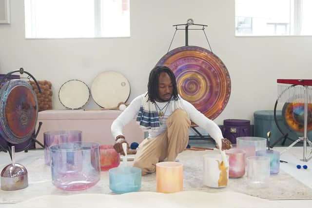 Kofi Masdammer, who says he 'cleanses' haunted homes as a side hustle. 