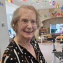 Ann Simpson, 86, recalled listening to Vera Lynn’s “We’ll Meet Again” on the radio, which helped take people’s minds off the heat.
