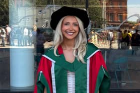 Katie Lloyd bagged a doctorate in marketing and strategy in March after spending four years completing her PHD all while rocking trendy outfits and bouncy blowouts