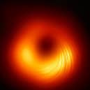 The M87 supermassive black hole in polarised light, photo courtesy of EHT Collaboration.