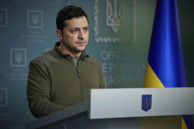 In this photo provided by the Ukrainian Presidential Press Office, Ukrainian President Volodymyr Zelenskyy delivers his speech addressing the nation in Kyiv, Ukraine, on Friday.