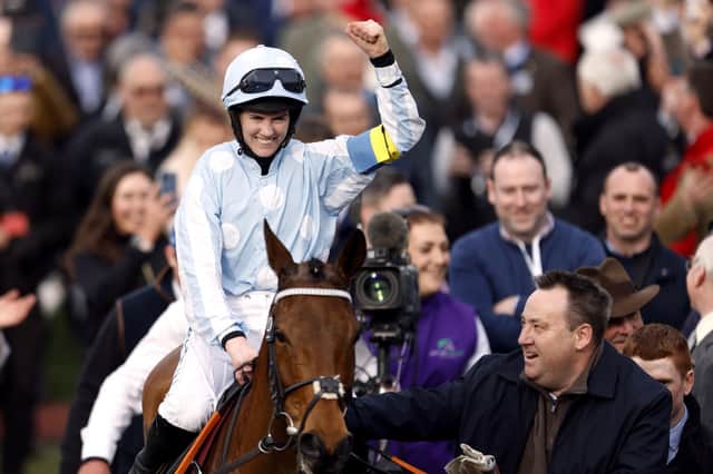 Jockey Rachael Blackmore celebrates after winning the Unibet Champion Hurdle Challenge Trophy on Honeysuckle during day one of the Cheltenham Festival at Cheltenham Racecourse. Those with the horse include former Ripon Grammar School pupil Zoe Smalley (purple top) who is travelling head lass to Henry de Bromhead.